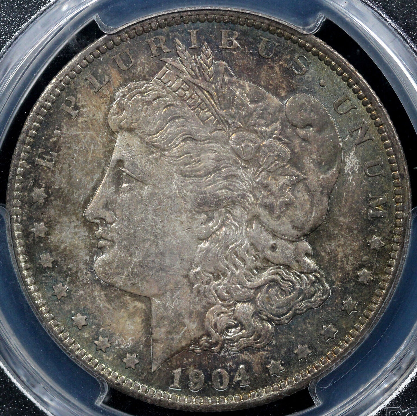 1904-O $1 Morgan Dollar PCGS and CAC MS 65 *Toning*